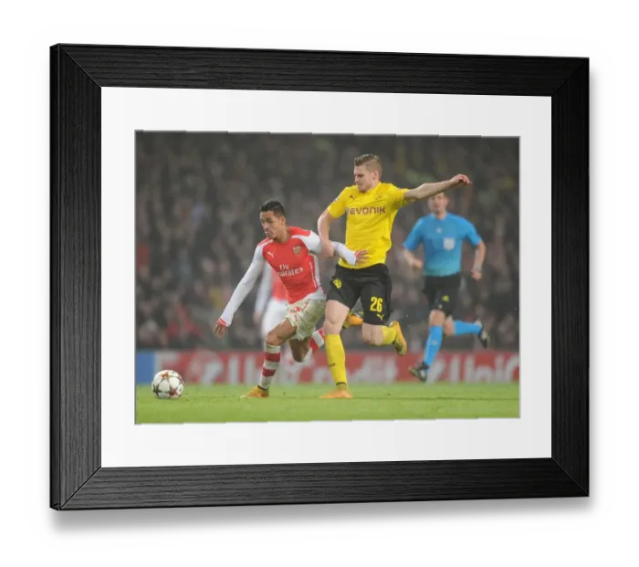 Framed Print : Arsenal's Alexis Sanchez Outmaneuvers Dortmund's Lukas Piszczek in 2014-15 Champions League Clash Framed Print : Arsenal's Alexis Sanchez Outmaneuvers Dortmund's Lukas Piszczek in 2014-15 Champions League Clash