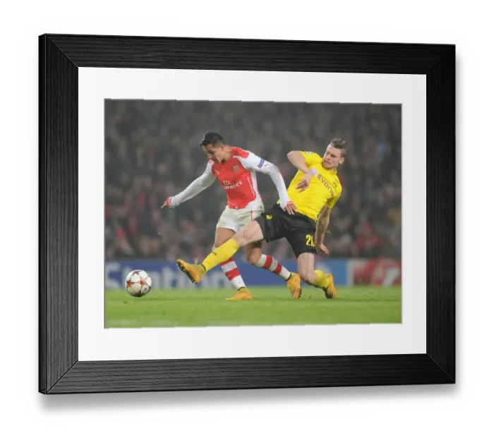 Framed Print : Arsenal's Alexis Sanchez Outmaneuvers Borussia Dortmund's Lukas Piszczek in 2014-15 Champions League Clash