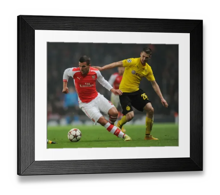 Framed Print : Podolski Outsmarts Piszczek: Thrilling Showdown between Arsenal and Dortmund in the 2014-15 Champions League Framed Print : Podolski Outsmarts Piszczek: Thrilling Showdown between Arsenal and Dortmund in the 2014-15 Champions League