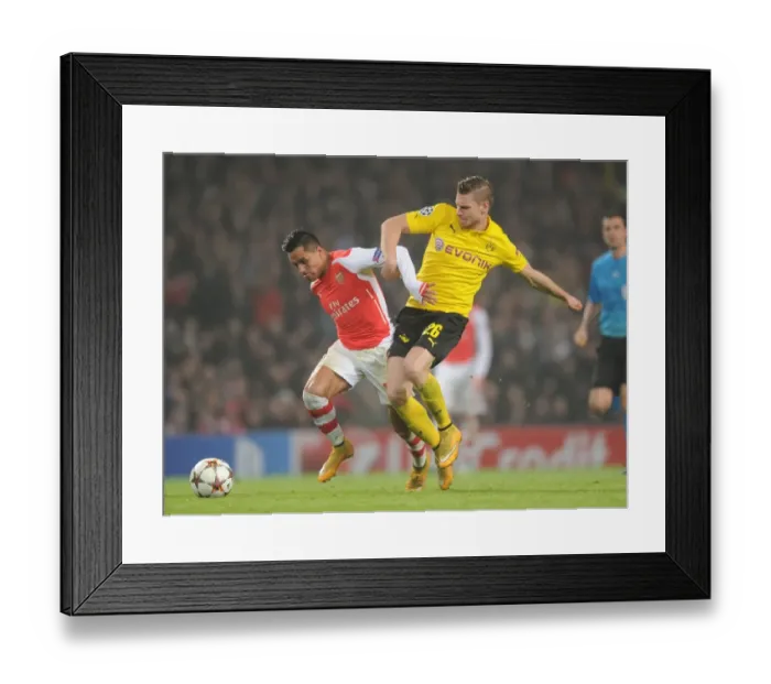 Framed Print : Alexis Sanchez Outsmarts Piszczek: Arsenal vs. Borussia Dortmund in Champions League, 2014-15 Framed Print : Alexis Sanchez Outsmarts Piszczek: Arsenal vs. Borussia Dortmund in Champions League, 2014-15