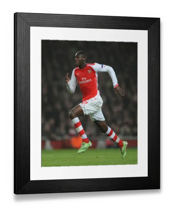 Framed Print : Arsenal's Yaya Sanogo Faces Borussia Dortmund in the UEFA Champions League Framed Print : Arsenal's Yaya Sanogo Faces Borussia Dortmund in the UEFA Champions League