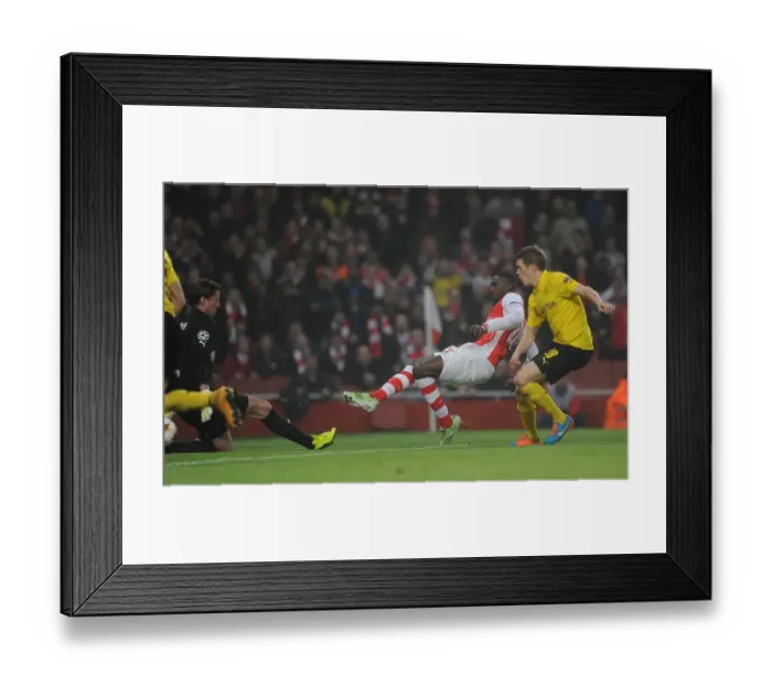 Framed Print : Yaya Sanogo Scores First Arsenal Goal Against Borussia Dortmund in Champions League Framed Print : Yaya Sanogo Scores First Arsenal Goal Against Borussia Dortmund in Champions League
