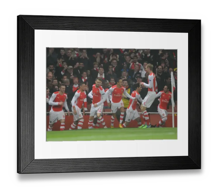 Framed Print : Yaya Sanogo celebrates scoring Arsenals 1st goal with his team mates. Arsenal 2