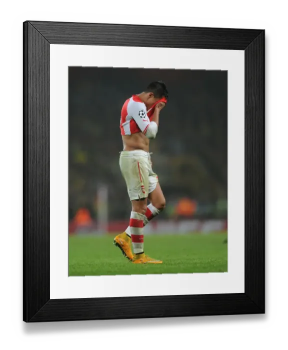 Framed Print : Champions League Showdown: Arsenal vs Borussia Dortmund - Arsenal's Alexis Sanchez Faces Off Framed Print : Champions League Showdown: Arsenal vs Borussia Dortmund - Arsenal's Alexis Sanchez Faces Off