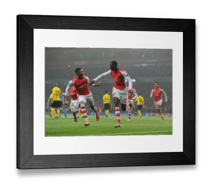 Framed Print : Arsenal Celebrate: Sanogo's Goal vs Borussia Dortmund, Champions League 2014-15 Framed Print : Arsenal Celebrate: Sanogo's Goal vs Borussia Dortmund, Champions League 2014-15