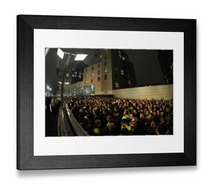 Framed Print : Champions League Showdown: Arsenal vs Borussia Dortmund at Emirates Stadium