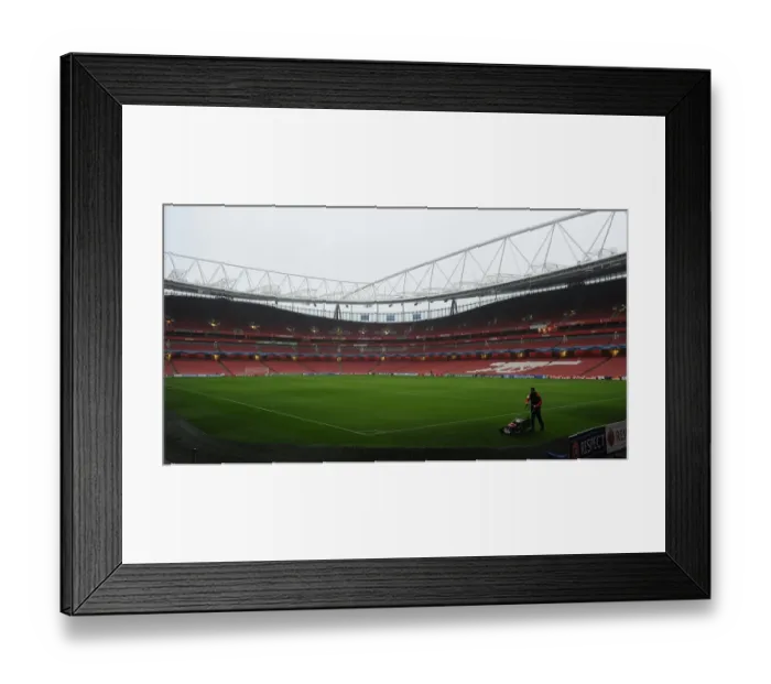 Framed Print : Champions League Clash: Arsenal vs Borussia Dortmund at Emirates Stadium (2014-15)