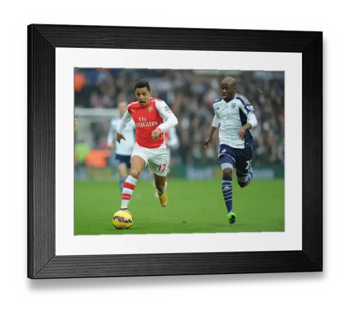 Framed Print : Alexis Sanchez Outmaneuvers Youssouf Mulumbu in Arsenal's Premier League Clash against West Bromwich Albion