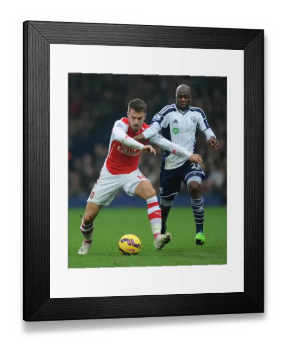 Framed Print : Clash at The Hawthorns: Ramsey vs. Mulumbu