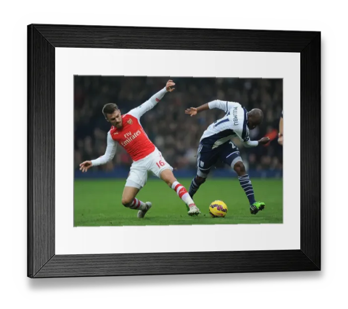 Framed Print : Clash of the Midfield Titans: Ramsey vs. Mulumbu - Football Intensity