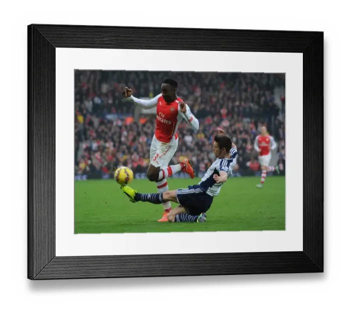 Framed Print : Welbeck vs Pocognoli: Intense Tackle in Arsenal's Premier League Clash with West Bromwich Albion