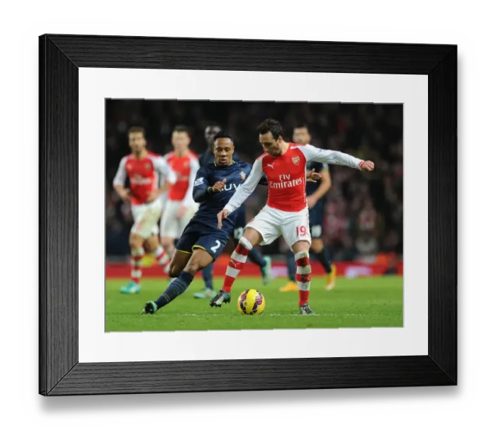 Framed Print : Santi Cazorla (Arsenal) Nathaniel Clyne (Southampton). Arsenal 1: 0 Southampton. Barclays Framed Print : Santi Cazorla (Arsenal) Nathaniel Clyne (Southampton). Arsenal 1: 0 Southampton. Barclays
