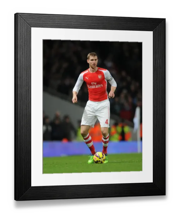 Framed Print : Per Mertesacker (Arsenal). Arsenal 1: 0 Southampton. Barclays Premier League. Emirates Stadium