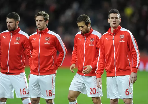 Nacho Monreal, Mathieu Flamini and Laurent Koscielny (Arsenal) before the match. Arsenal 1