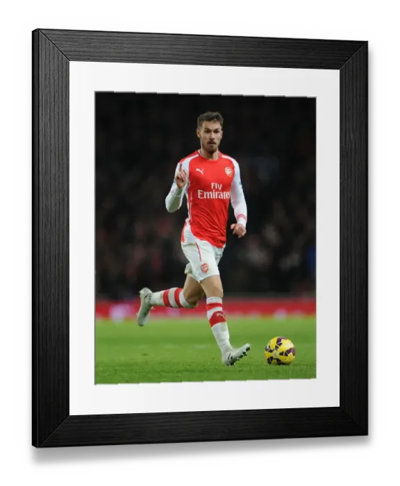 Framed Print : Aaron Ramsey in Action: Arsenal vs Southampton, Premier League 2014-15