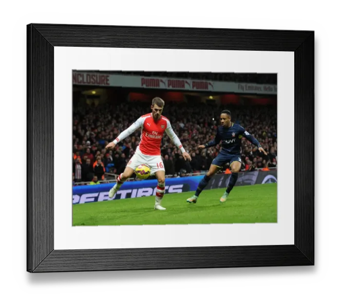 Framed Print : Aaron Ramsey (Arsenal) Nathaniel Clyne (Southampton). Arsenal 1: 0 Southampton. Barclays