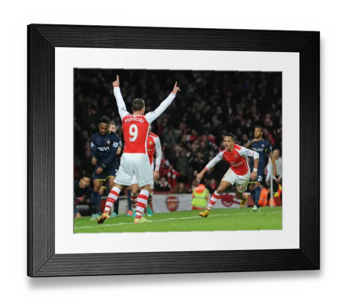 Framed Print : Alexis Sanchez celebrates scoring Arsenals goal. Arsenal 1: 0 Southampton. Barclays Premier League Framed Print : Alexis Sanchez celebrates scoring Arsenals goal. Arsenal 1: 0 Southampton. Barclays Premier League