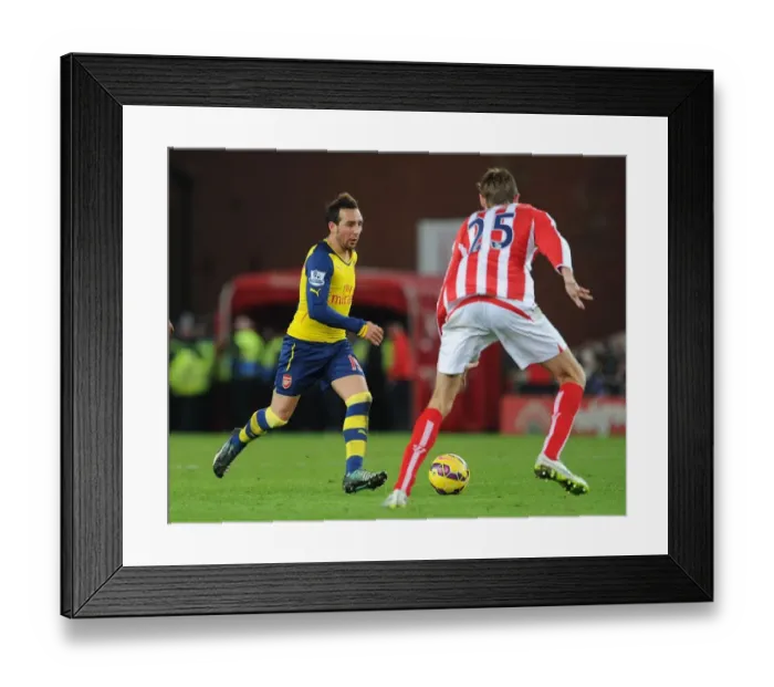 Framed Print : Santi Cazorla vs. Peter Crouch: Battle at Britannia Stadium (Arsenal vs. Stoke City, Premier League 2014-15) Framed Print : Santi Cazorla vs. Peter Crouch: Battle at Britannia Stadium (Arsenal vs. Stoke City, Premier League 2014-15)