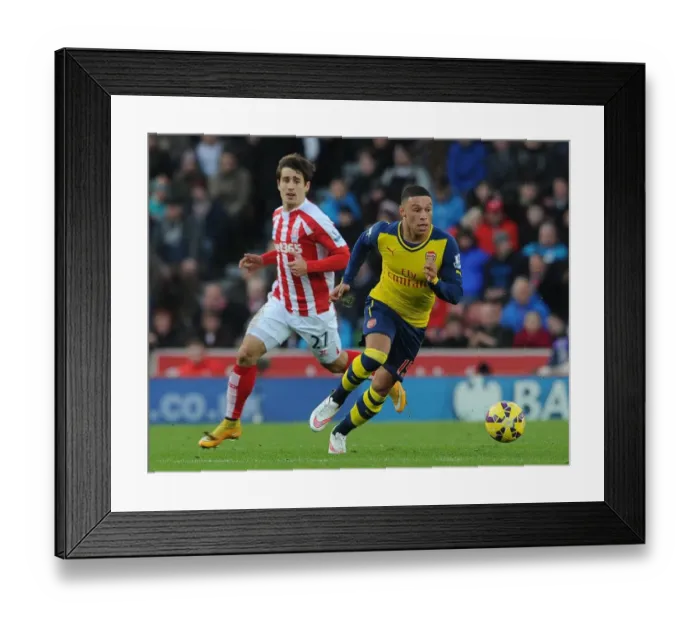 Framed Print : Clash of Talents: Oxlade-Chamberlain vs. Bojan at Stoke City vs. Arsenal (2014-15) Framed Print : Clash of Talents: Oxlade-Chamberlain vs. Bojan at Stoke City vs. Arsenal (2014-15)