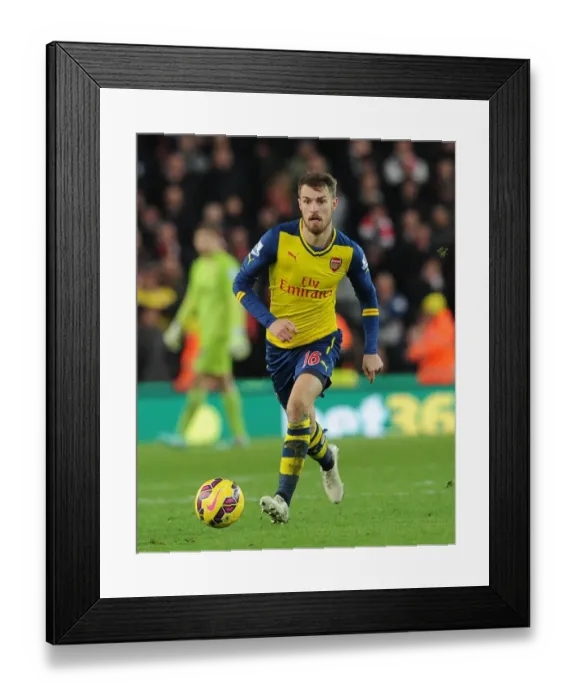 Framed Print : Aaron Ramsey in Action: Stoke City vs. Arsenal, Premier League 2014-15