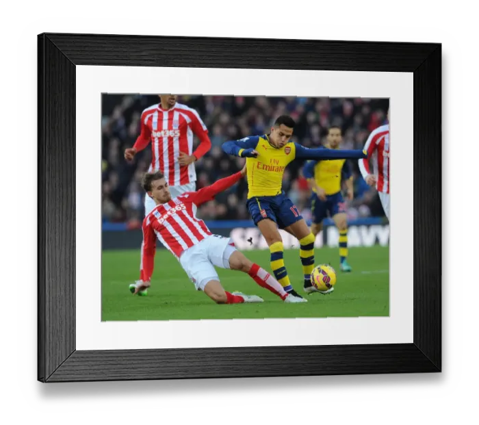 Framed Print : Clash at Britannia: Sanchez vs Muniesa, Premier League Showdown