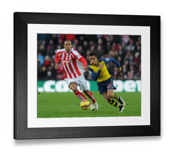 Framed Print : Clash of Forces: Sanchez vs Nzonzi in Stoke City vs Arsenal (2014-15) Framed Print : Clash of Forces: Sanchez vs Nzonzi in Stoke City vs Arsenal (2014-15)