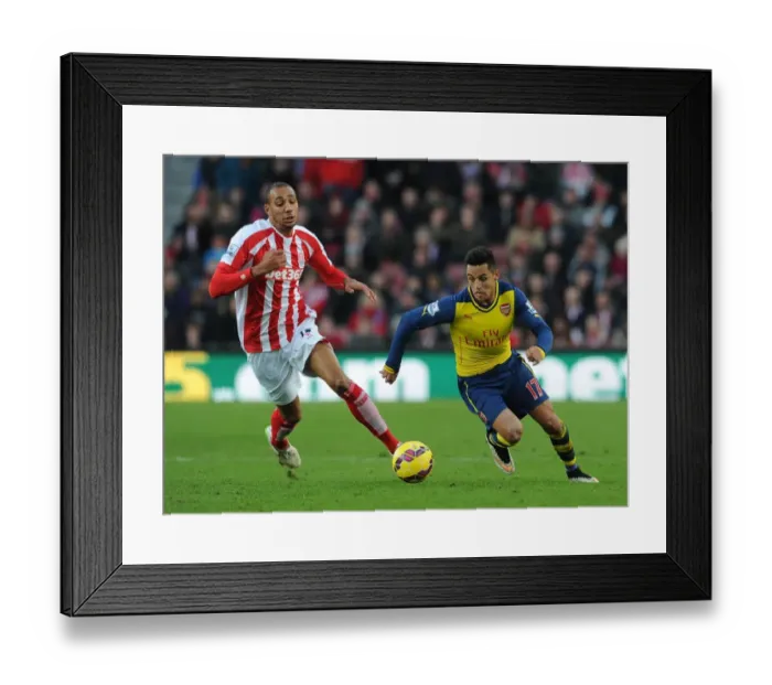 Framed Print : Clash of Stars: Sanchez vs Nzonzi in Stoke City vs Arsenal (2014-15)