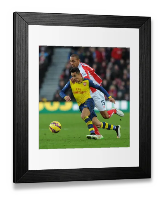 Framed Print : Clash of Stars: Sanchez vs Nzonzi - A Football Battle at Britannia Stadium (2014-15) Framed Print : Clash of Stars: Sanchez vs Nzonzi - A Football Battle at Britannia Stadium (2014-15)
