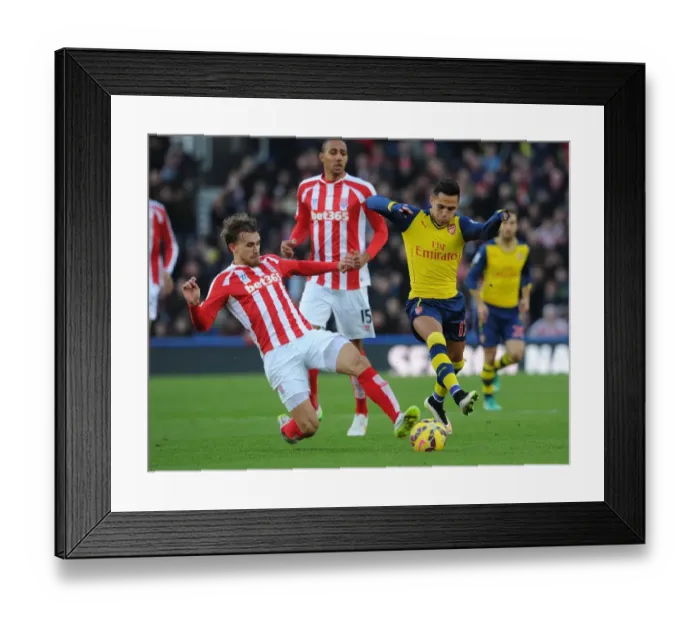 Framed Print : Sanchez vs Muniesa: A Premier League Clash at Britannia