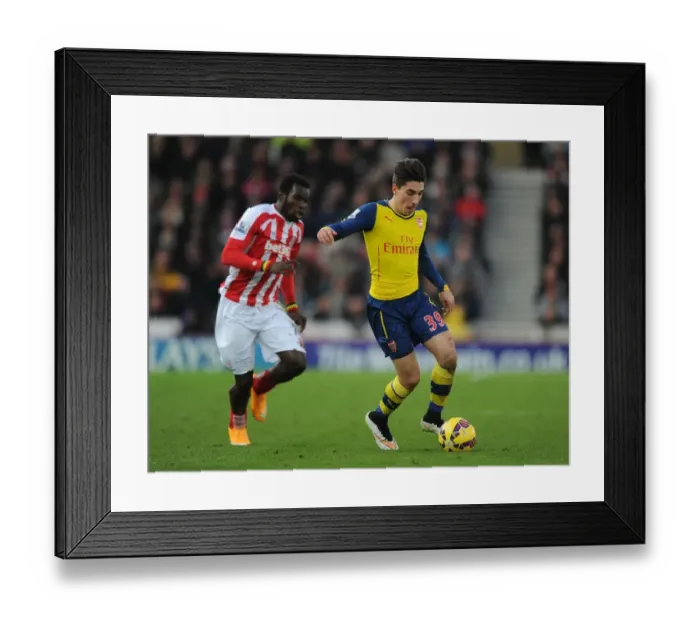 Framed Print : Hector Bellerin Outmaneuvers Mame Diouf: A Moment from Stoke City vs. Arsenal (2014-15)