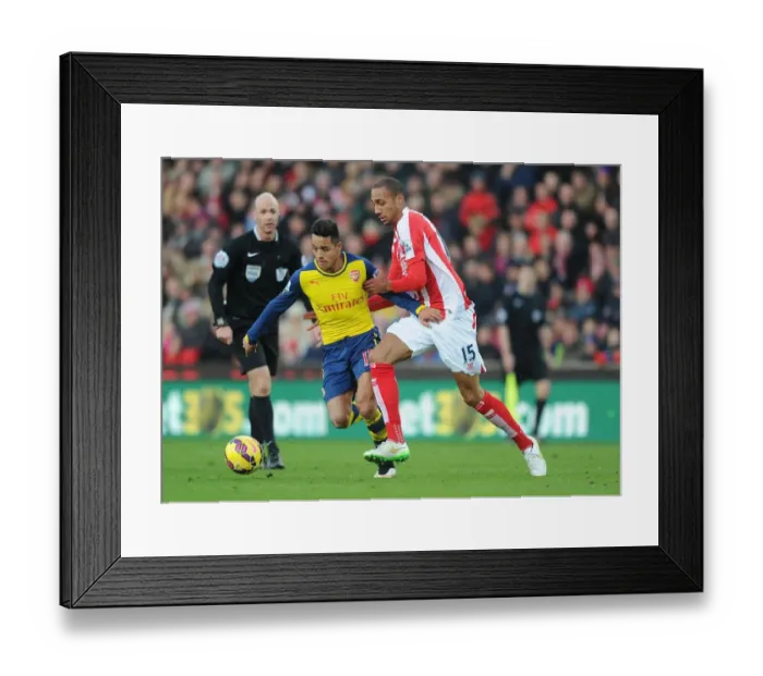 Framed Print : Intense Rivalry on the Pitch: Alexis Sanchez vs. Steven Nzonzi (Stoke City vs. Arsenal, Premier League, 2014) Framed Print : Intense Rivalry on the Pitch: Alexis Sanchez vs. Steven Nzonzi (Stoke City vs. Arsenal, Premier League, 2014)