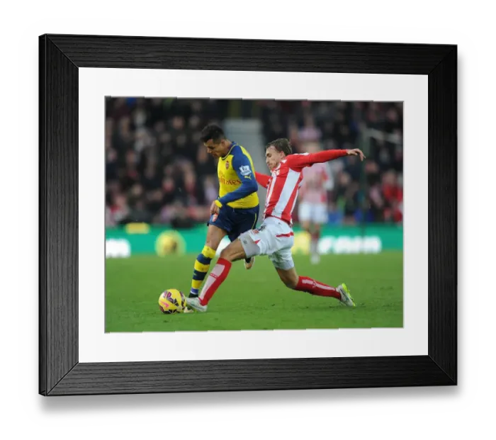 Framed Print : Alexis Sanchez's Sneaky Move: Outsmarting Marc Muniesa in the Stoke City vs. Arsenal Clash (2014-15) Framed Print : Alexis Sanchez's Sneaky Move: Outsmarting Marc Muniesa in the Stoke City vs. Arsenal Clash (2014-15)