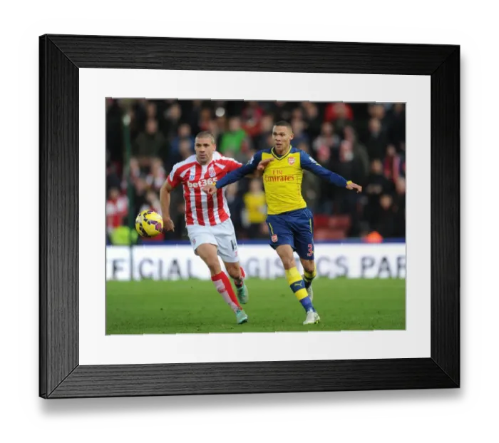 Framed Print : Arsenal's Kieran Gibbs Outsmarts Jonathan Walters: A Footballing Masterclass from the Stoke vs. Arsenal Match (2014-15) Framed Print : Arsenal's Kieran Gibbs Outsmarts Jonathan Walters: A Footballing Masterclass from the Stoke vs. Arsenal Match (2014-15)