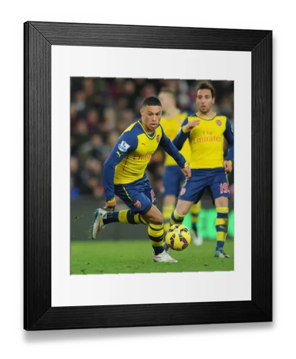 Framed Print : Alex Oxlade-Chamberlain in Action: Arsenal vs Stoke City, Premier League 2014-15 Framed Print : Alex Oxlade-Chamberlain in Action: Arsenal vs Stoke City, Premier League 2014-15