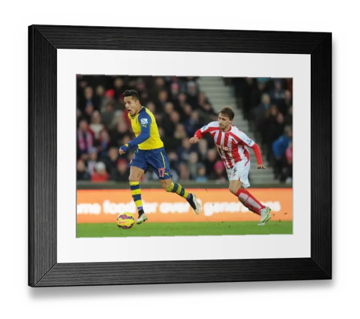 Framed Print : Alexis Sanchez's Mesmerizing Skill: Outmaneuvering Marc Muniesa in the Stoke City vs. Arsenal Clash (2014-15) Framed Print : Alexis Sanchez's Mesmerizing Skill: Outmaneuvering Marc Muniesa in the Stoke City vs. Arsenal Clash (2014-15)