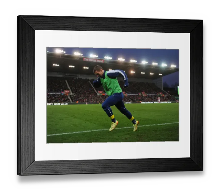 Framed Print : Lukas Podolski's Standout Performance: Arsenal at Stoke City (2014-15)