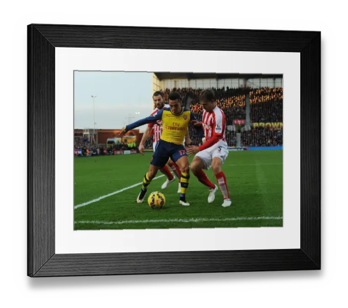 Framed Print : Clash of Titans: Sanchez vs Pieters-Muniesa at Stoke City vs Arsenal (2014-15) Framed Print : Clash of Titans: Sanchez vs Pieters-Muniesa at Stoke City vs Arsenal (2014-15)