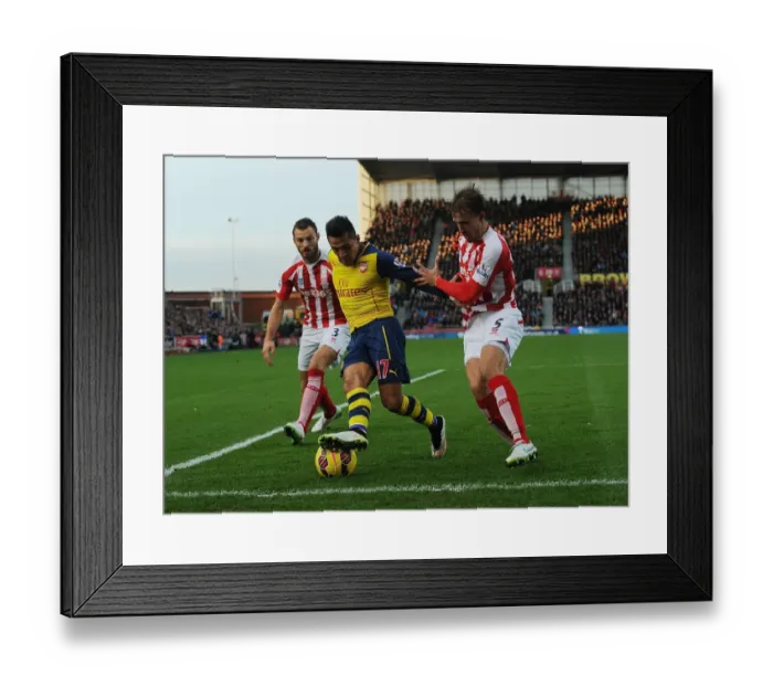 Framed Print : Clash of Forces: Sanchez vs Pieters & Muniesa (Stoke City vs Arsenal, 2014-15)