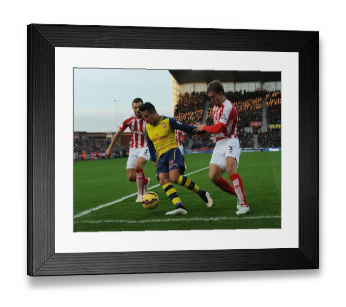 Framed Print : Clash of Forces: Sanchez vs Pieters & Muniesa - Arsenal's Star Forward Battles Stoke's Defenders (2014-15) Framed Print : Clash of Forces: Sanchez vs Pieters & Muniesa - Arsenal's Star Forward Battles Stoke's Defenders (2014-15)