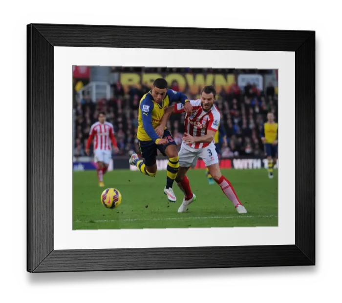 Framed Print : Clash at the Britannia: Oxlade-Chamberlain vs Pieters Framed Print : Clash at the Britannia: Oxlade-Chamberlain vs Pieters