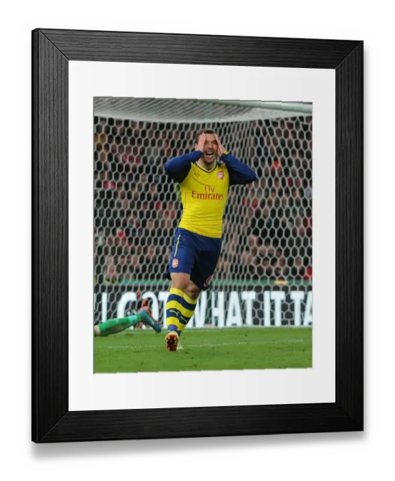 Framed Print : Heartbreaking Miss: Lukas Podolski at Stoke City (Arsenal vs. Stoke City, 2014-15 Premier League)