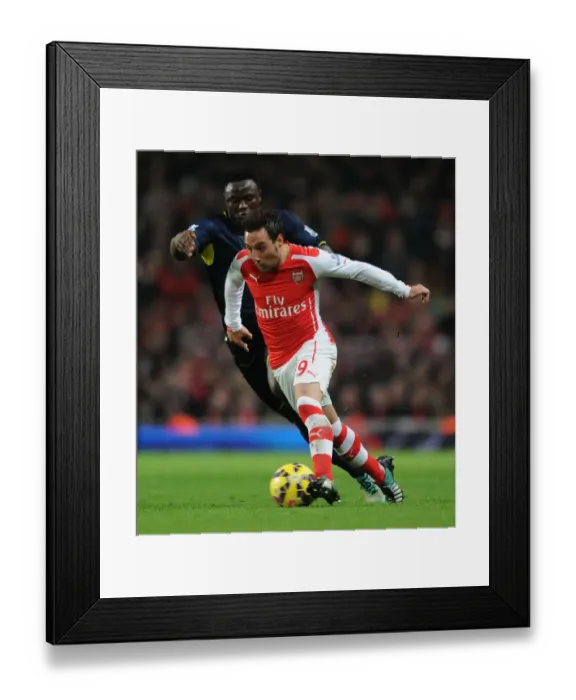Framed Print : Arsenal's Santi Cazorla Outmaneuvers Southampton's Victor Wanyama in Premier League Clash Framed Print : Arsenal's Santi Cazorla Outmaneuvers Southampton's Victor Wanyama in Premier League Clash