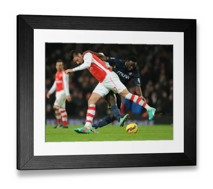 Framed Print : Giroud vs. Wanyama: A Battle of Strength in the Arsenal vs. Southampton Clash, Premier League 2014-15 Framed Print : Giroud vs. Wanyama: A Battle of Strength in the Arsenal vs. Southampton Clash, Premier League 2014-15
