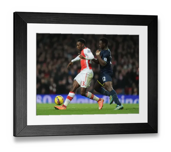 Framed Print : Arsenal's Danny Welbeck Outmuscles Victor Wanyama in Intense Premier League Clash Framed Print : Arsenal's Danny Welbeck Outmuscles Victor Wanyama in Intense Premier League Clash