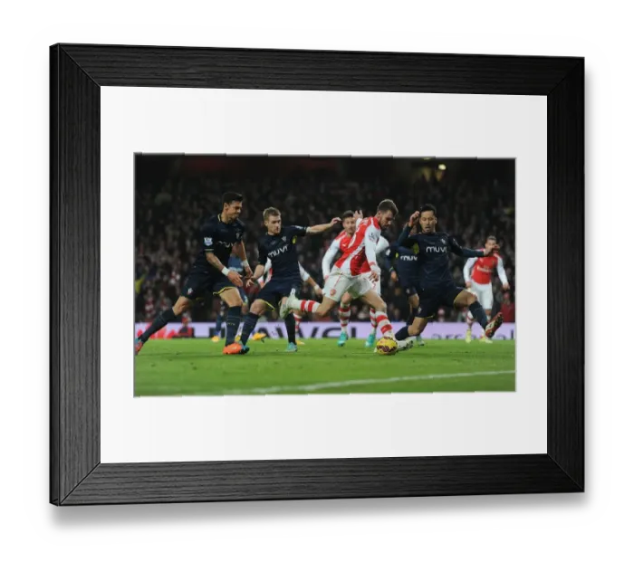 Framed Print : Arsenal's Ramsey Clashes with Southampton's Yoshida and Davis during Premier League Match Framed Print : Arsenal's Ramsey Clashes with Southampton's Yoshida and Davis during Premier League Match