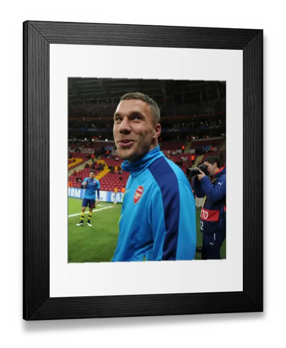 Framed Print : Arsenal's Lukas Podolski Warming Up Ahead of Galatasaray Clash in Istanbul, UEFA Champions League 2014 / 15