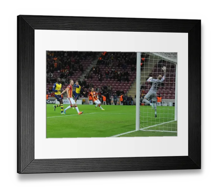 Framed Print : Lukas Podolski Scores Past Sinan Bolat: Arsenal's Victory Over Galatasaray in UEFA Champions League Framed Print : Lukas Podolski Scores Past Sinan Bolat: Arsenal's Victory Over Galatasaray in UEFA Champions League