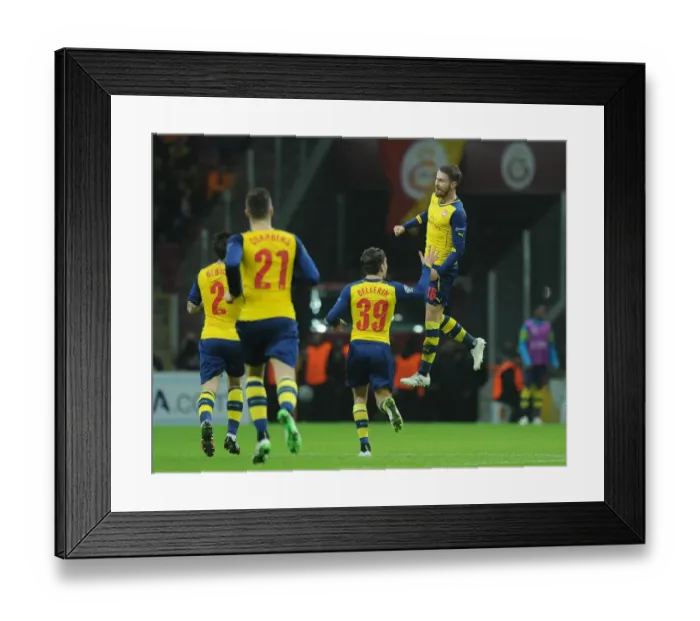 Framed Print : Arsenal's Ramsey and Bellerin Celebrate Goal Against Galatasaray in UEFA Champions League Framed Print : Arsenal's Ramsey and Bellerin Celebrate Goal Against Galatasaray in UEFA Champions League