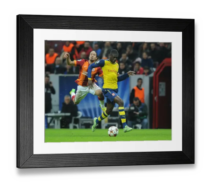 Framed Print : Yaya Sanogo Breaks Past Tank Camdal: Galatasaray vs. Arsenal, UEFA Champions League, Istanbul, Turkey, 2014 Framed Print : Yaya Sanogo Breaks Past Tank Camdal: Galatasaray vs. Arsenal, UEFA Champions League, Istanbul, Turkey, 2014