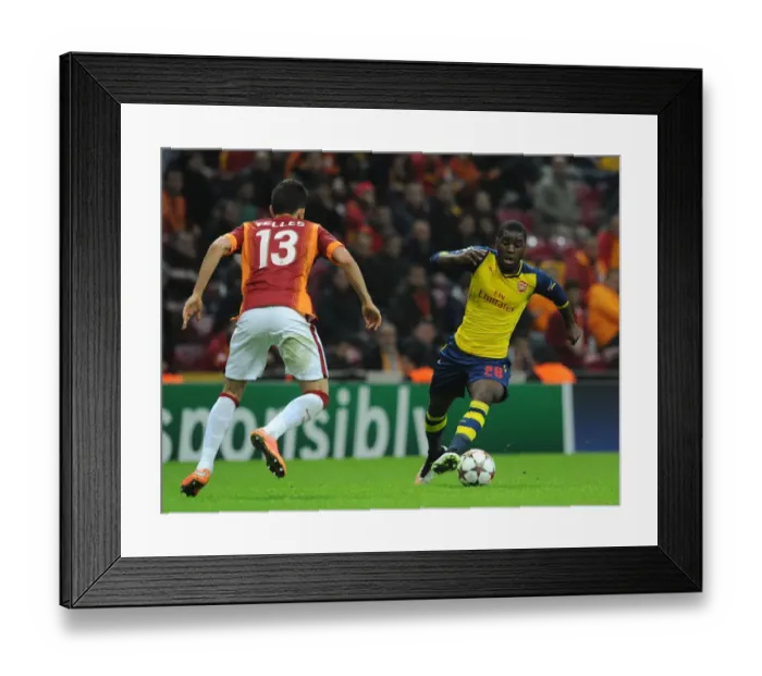 Framed Print : Joel Campbell vs. Alex Telles: Battle in the Champions League between Galatasaray and Arsenal